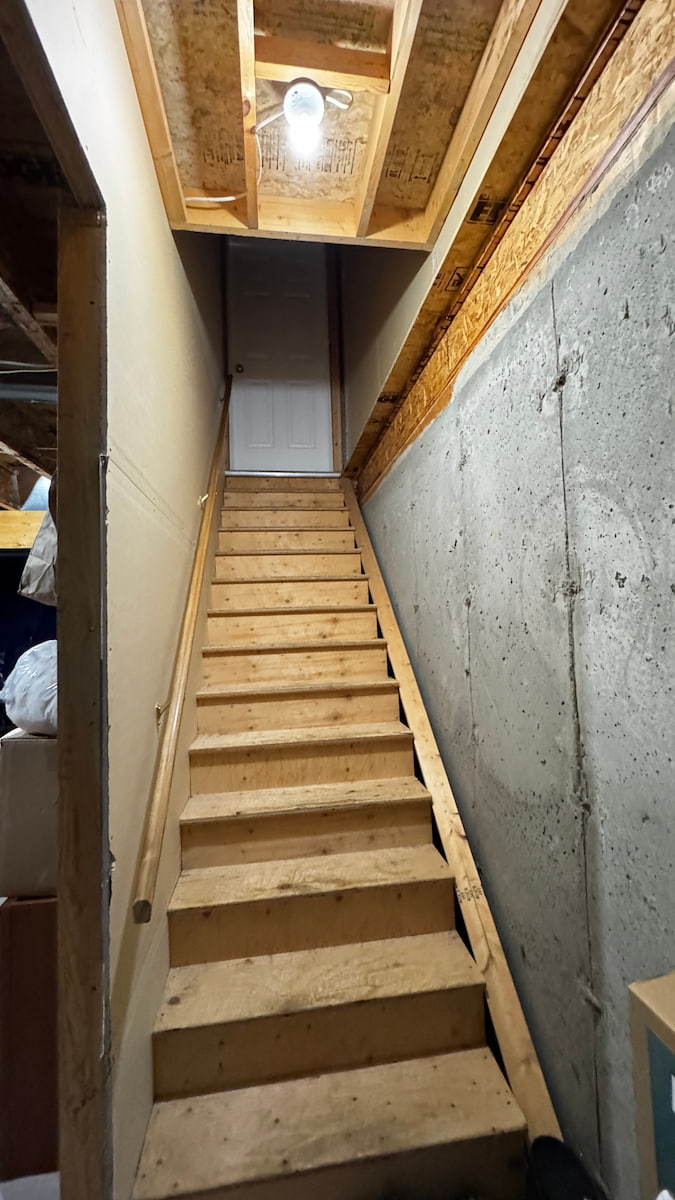 Staircase area before laminate flooring, Saskatoon